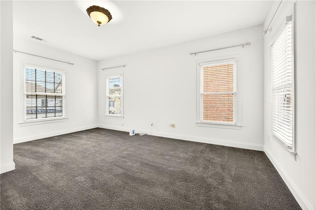 455 High Pointe Trail Roswell, GA 30076 - Photo 36 of 46 an empty room with windows