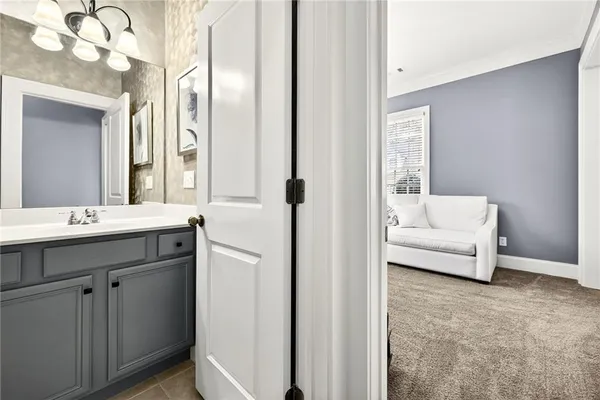 a kitchen with stainless steel appliances granite countertop a stove a sink dishwasher and cabinets with wooden floor