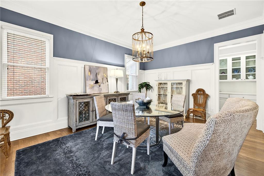 455 High Pointe Trail Roswell, GA 30076 - Photo 9 of 46 a view of a dining room with furniture and window
