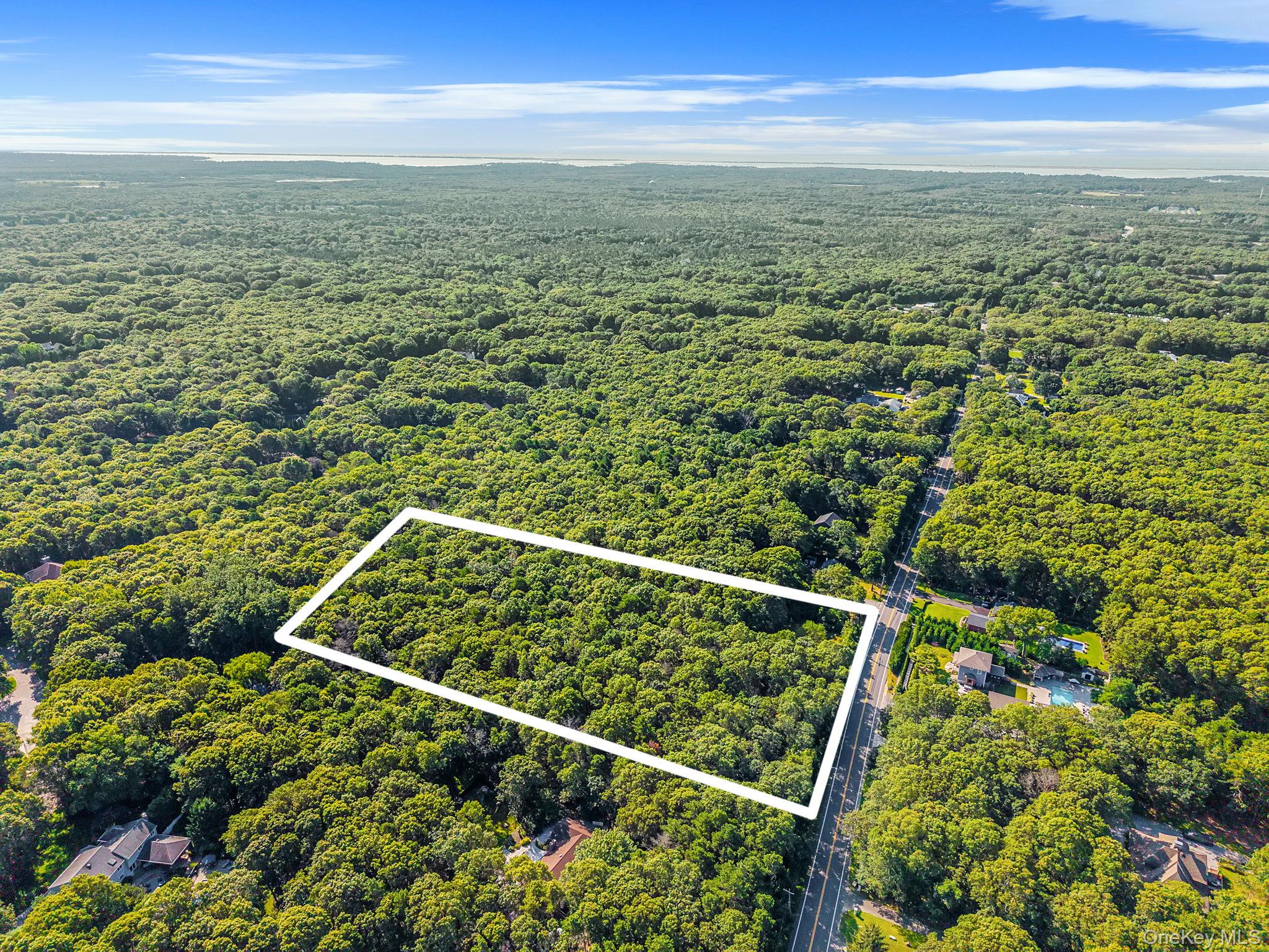 200 Wading River Road Manorville, NY 11949 - Photo 20 of 31 a view of a yard from a balcony