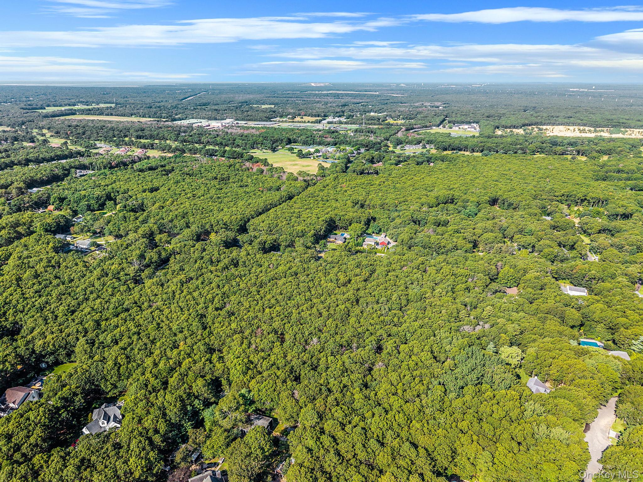 200 Wading River Road Manorville, NY 11949 - Photo 25 of 31 a view of a city with an ocean