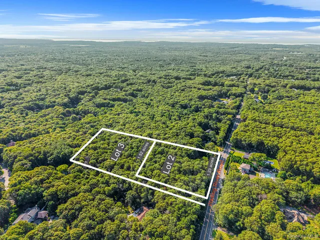 a view of a yard with an ocean