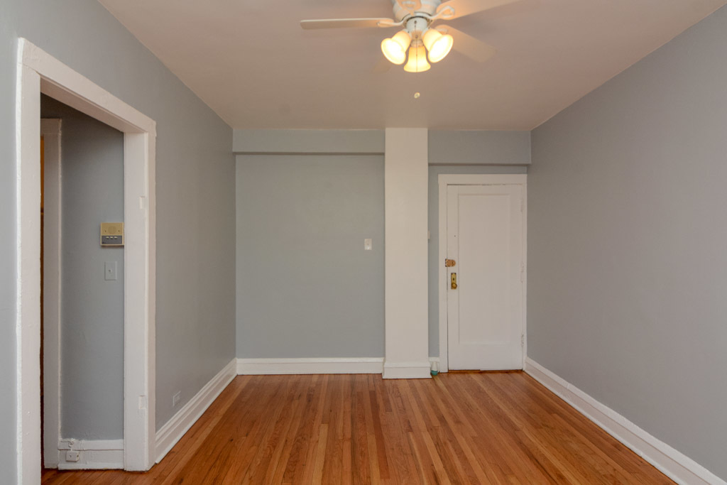 4606 North Beacon Street, Unit 2B Chicago, IL 60640 - Photo 11 of 20 a view of an empty room with wooden floor