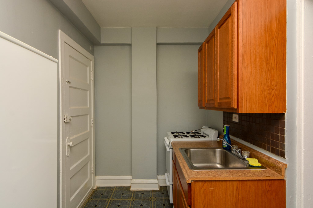 4606 North Beacon Street, Unit 2B Chicago, IL 60640 - Photo 2 of 20 a kitchen with a sink and cabinets