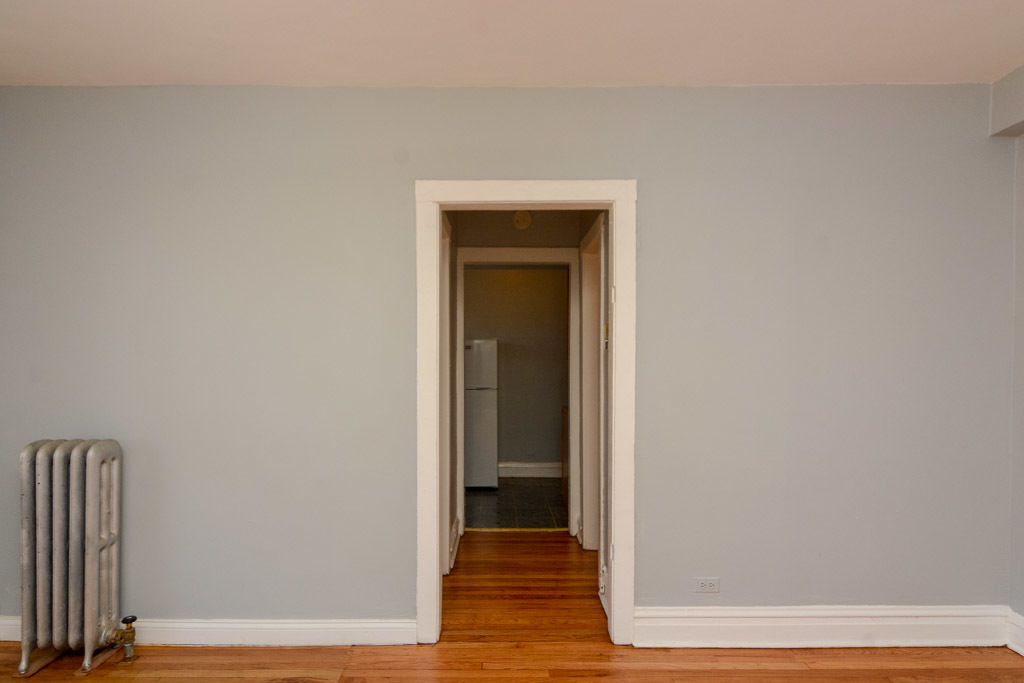 4606 North Beacon Street, Unit 2B Chicago, IL 60640 - Photo 9 of 20 a view of a hallway with wooden floor