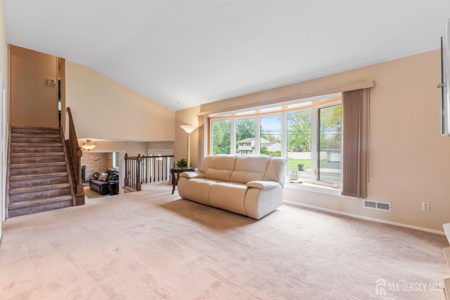 12 Sullivan Way East Brunswick, NJ 08816 - Photo 15 of 40 a living room with furniture and a large window