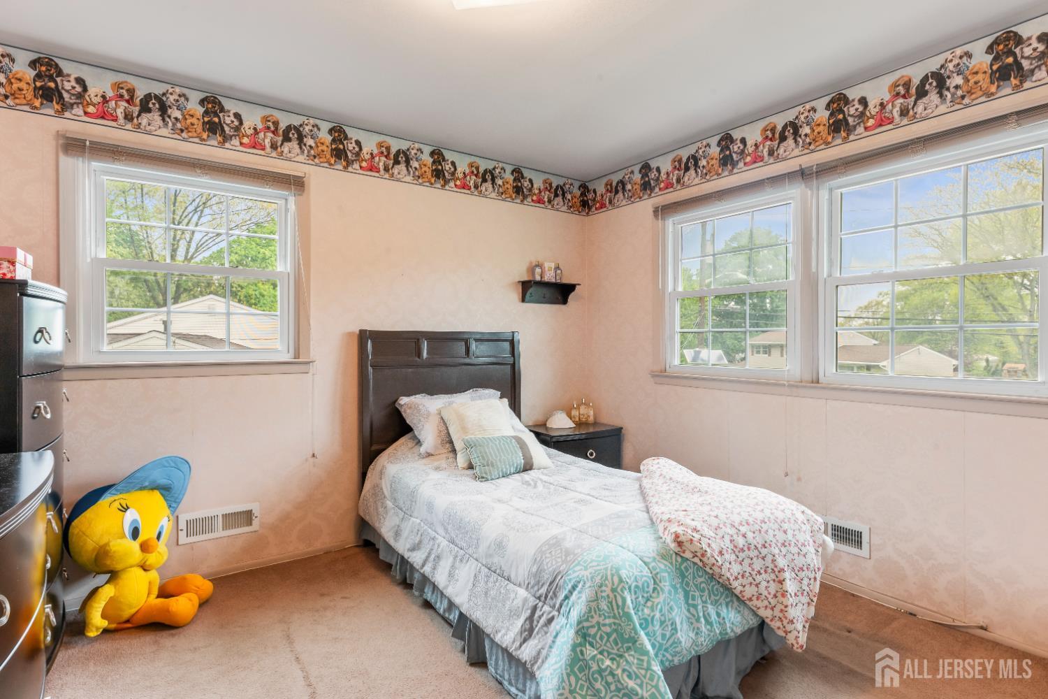12 Sullivan Way East Brunswick, NJ 08816 - Photo 28 of 40 a bedroom with a bed and a window