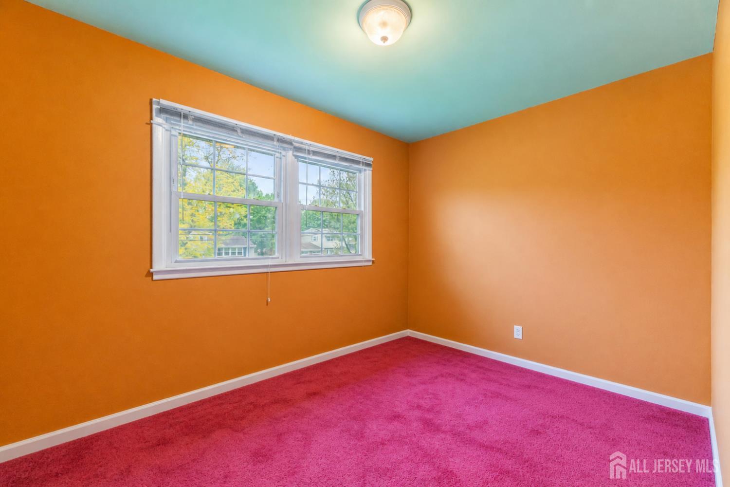 12 Sullivan Way East Brunswick, NJ 08816 - Photo 31 of 40 an empty room with a window