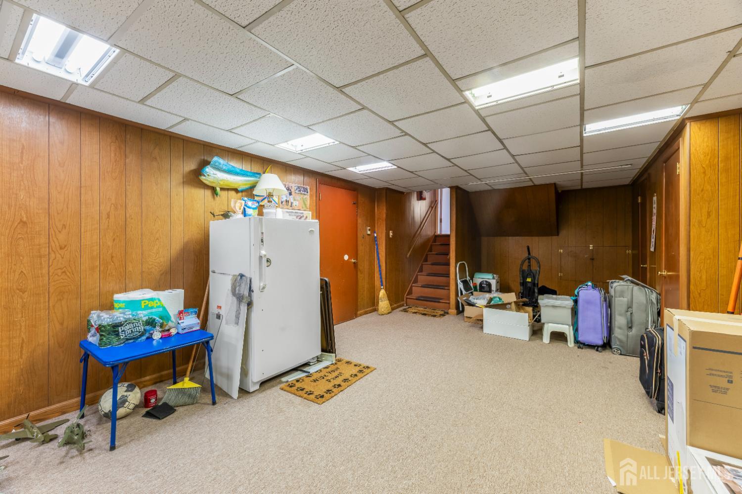12 Sullivan Way East Brunswick, NJ 08816 - Photo 34 of 40 a garage with table and chairs