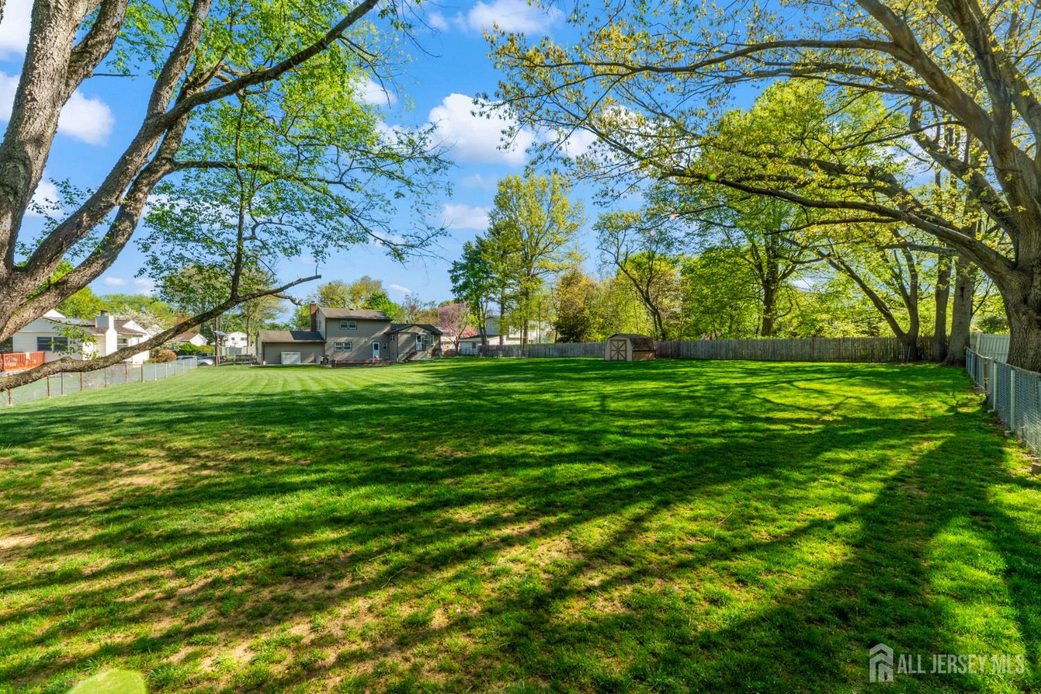 12 Sullivan Way East Brunswick, NJ 08816 - Photo 6 of 40 a view of yard with green space