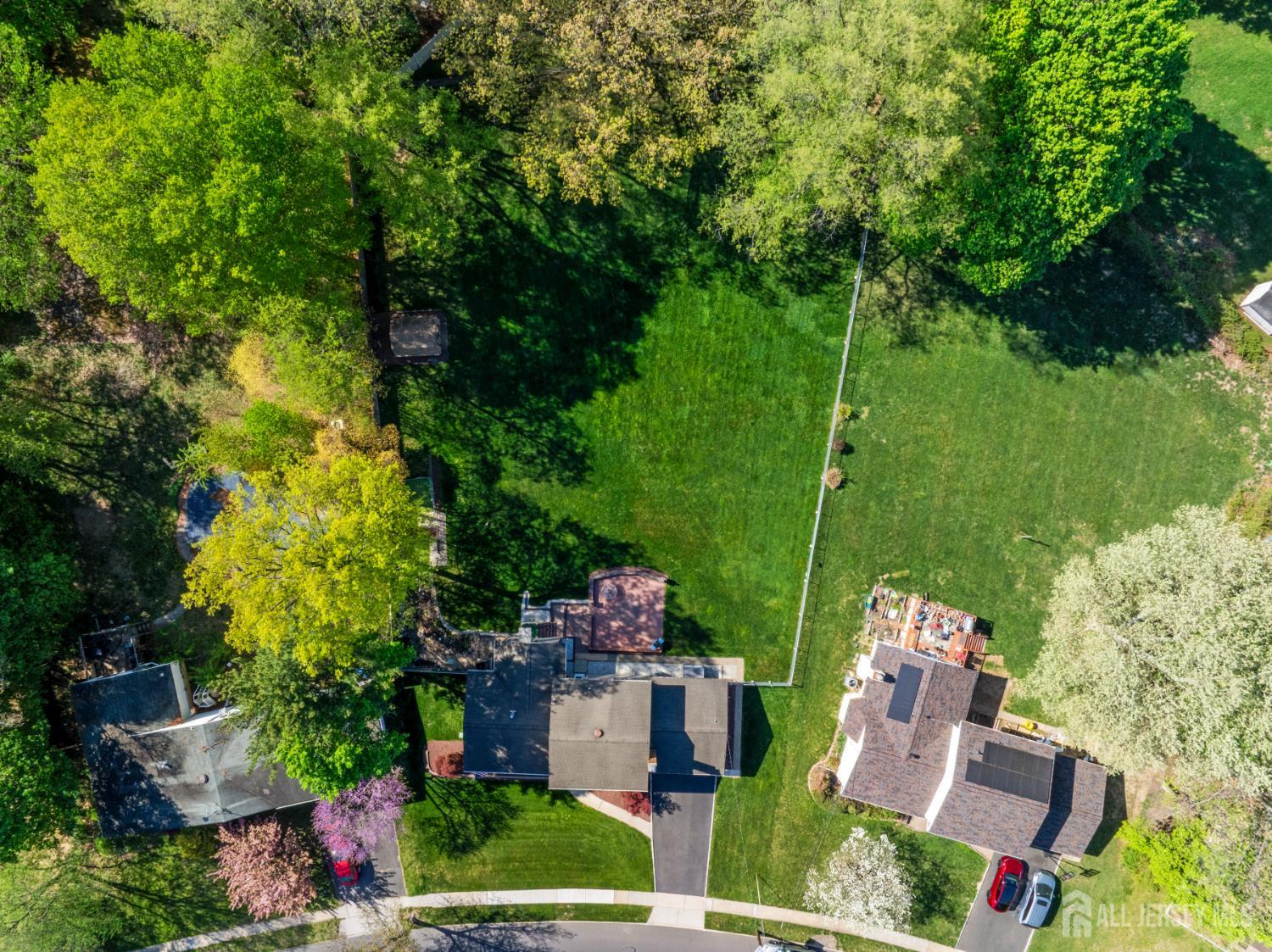 12 Sullivan Way East Brunswick, NJ 08816 - Photo 8 of 40 an aerial view of a house with swimming pool garden and patio
