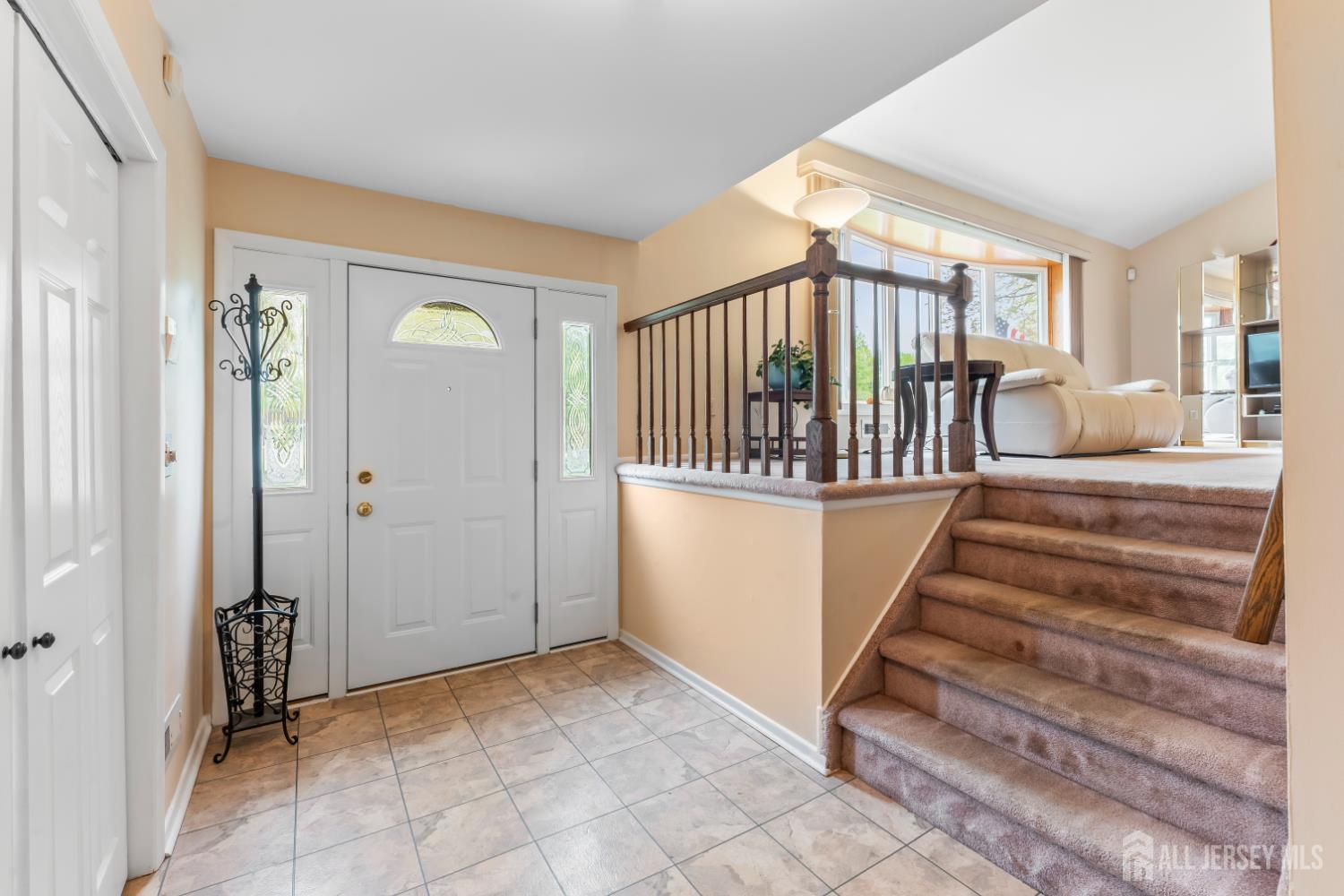 12 Sullivan Way East Brunswick, NJ 08816 - Photo 10 of 40 a view of entryway and hall with wooden floor