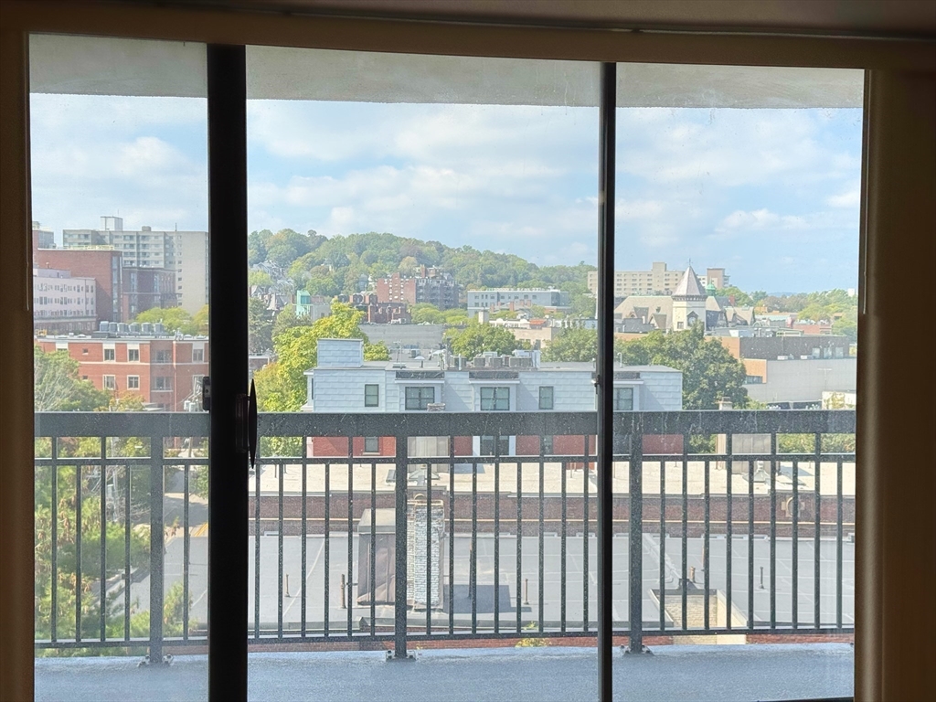 60 Longwood Avenue, Unit 802 Brookline, MA 02446 - Photo 2 of 16 a view of a city from a glass window