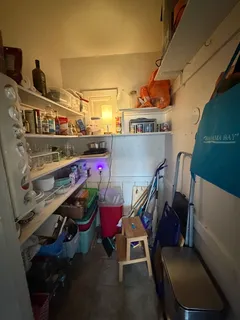 a utility room with dryer and