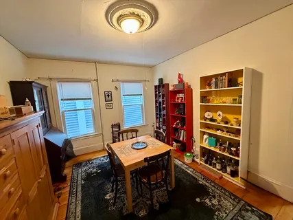 a view of a workspace with furniture