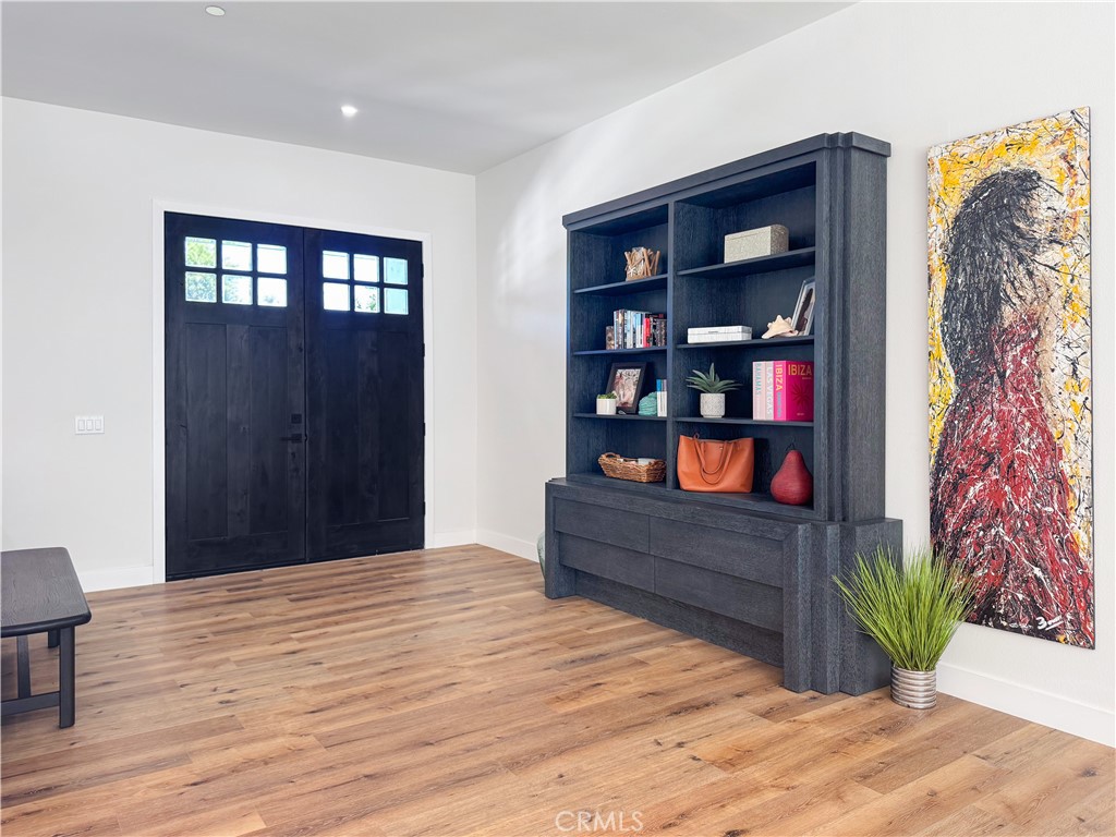 30233 Del Rey Road Temecula, CA 92591 - Photo 17 of 64 a bed room with a bed and a book shelf