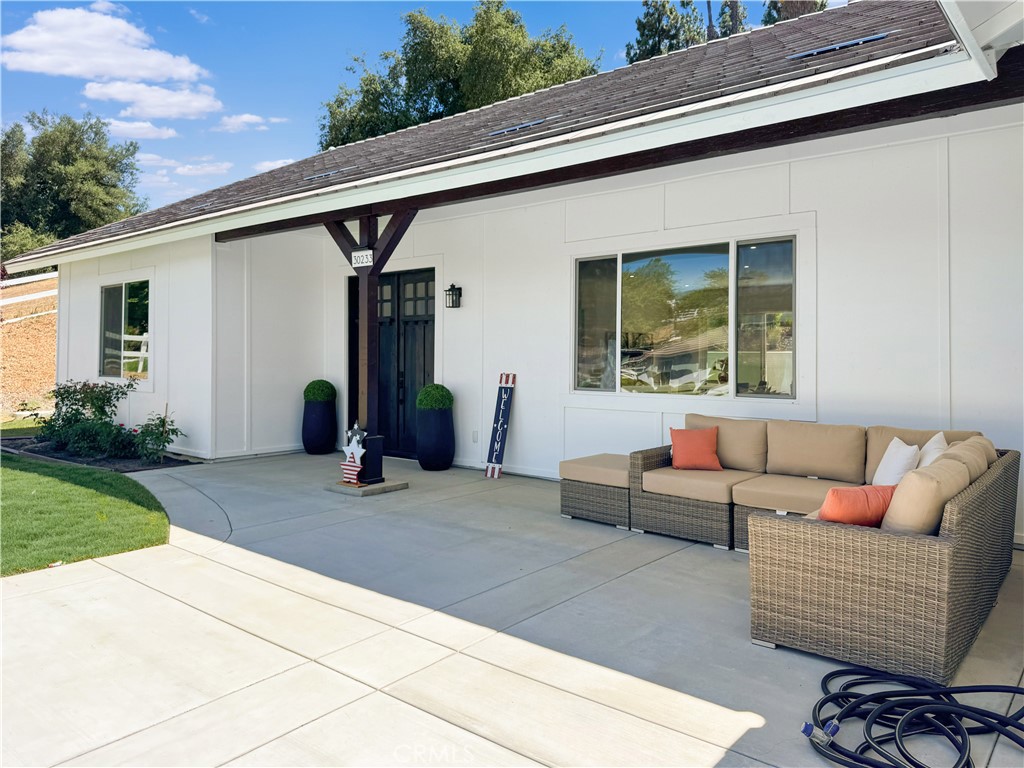 30233 Del Rey Road Temecula, CA 92591 - Photo 61 of 64 a view of a patio with couches chairs and potted plants