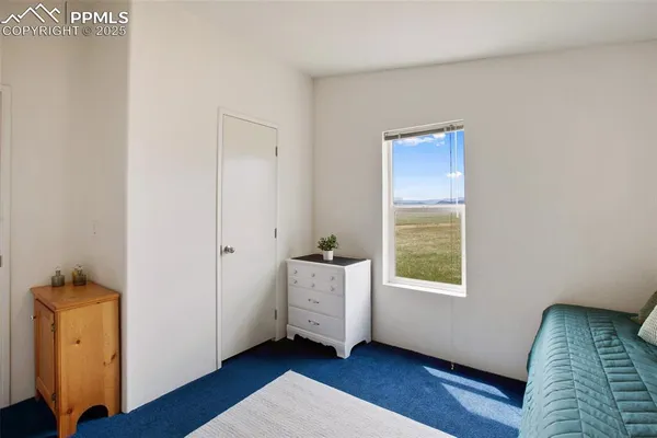 a view of a livingroom with furniture and wooden floor