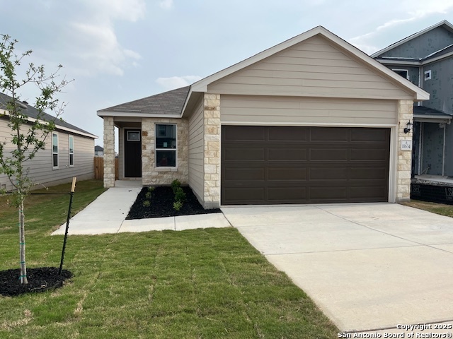 11634 Black Rose San Antonio, TX 78245 - Photo 1 of 1 a front view of a house with a yard