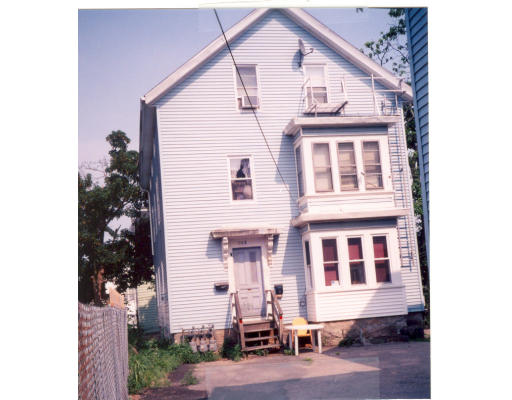 652 2nd Street Fall River, MA 02721 - Photo 1 of 1 a front view of a house with many windows