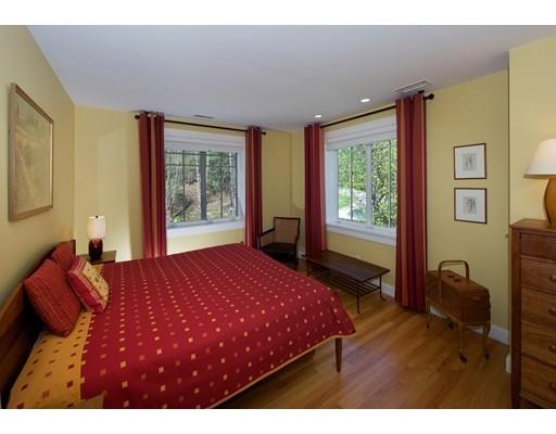 91 Fairview Road Weston, MA 02493 - Photo 19 of 23 a bedroom with a bed dresser and a window