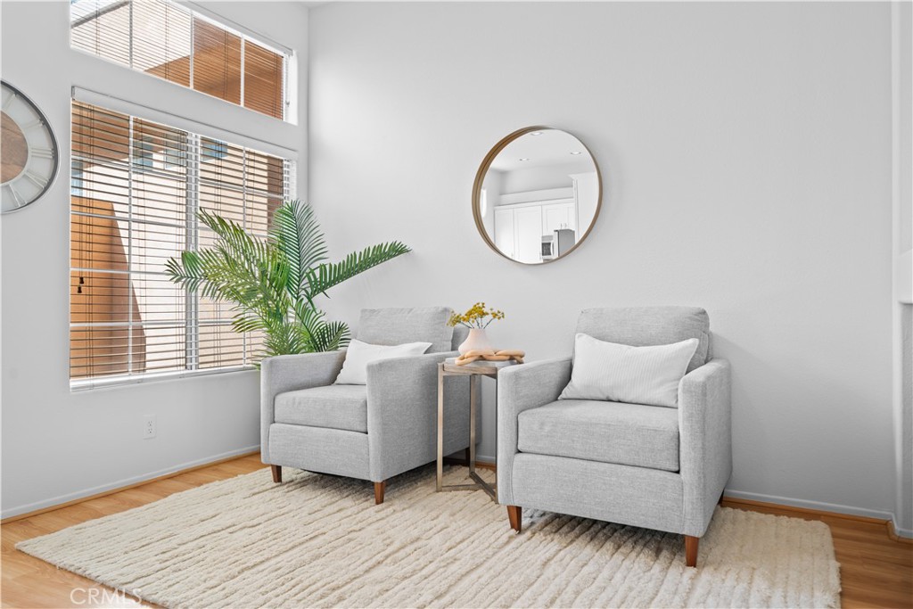 6 Arese Aisle Irvine, CA 92606 - Photo 11 of 38 a living room with furniture and a window