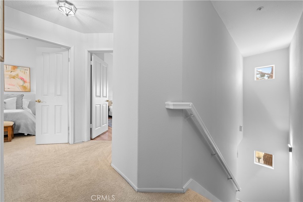 6 Arese Aisle Irvine, CA 92606 - Photo 15 of 38 a view of a livingroom with furniture and staircase