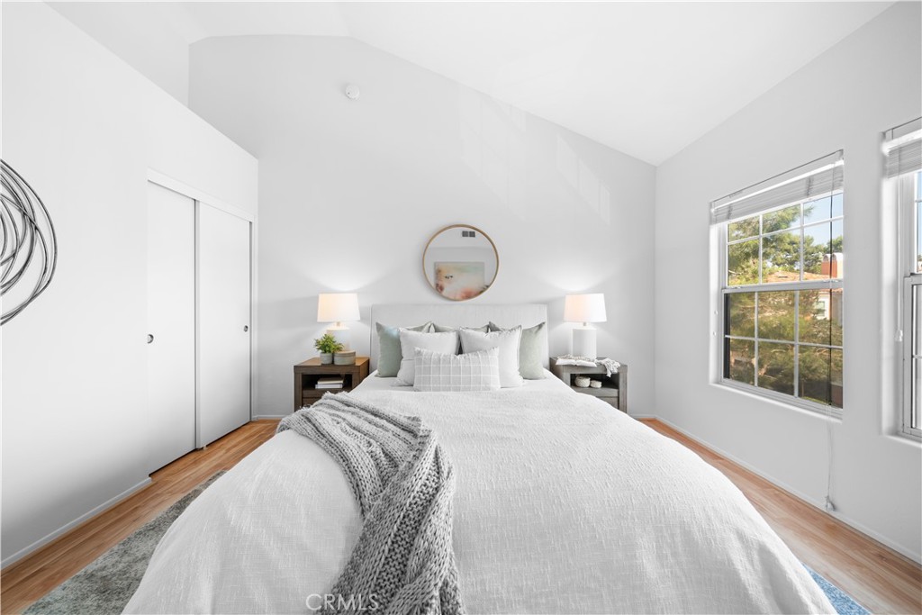 6 Arese Aisle Irvine, CA 92606 - Photo 20 of 38 a bedroom with a large bed and a window