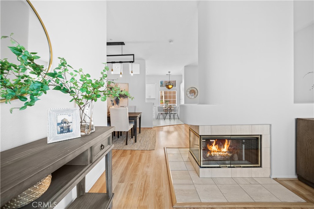 6 Arese Aisle Irvine, CA 92606 - Photo 5 of 38 a living room with furniture and a potted plant