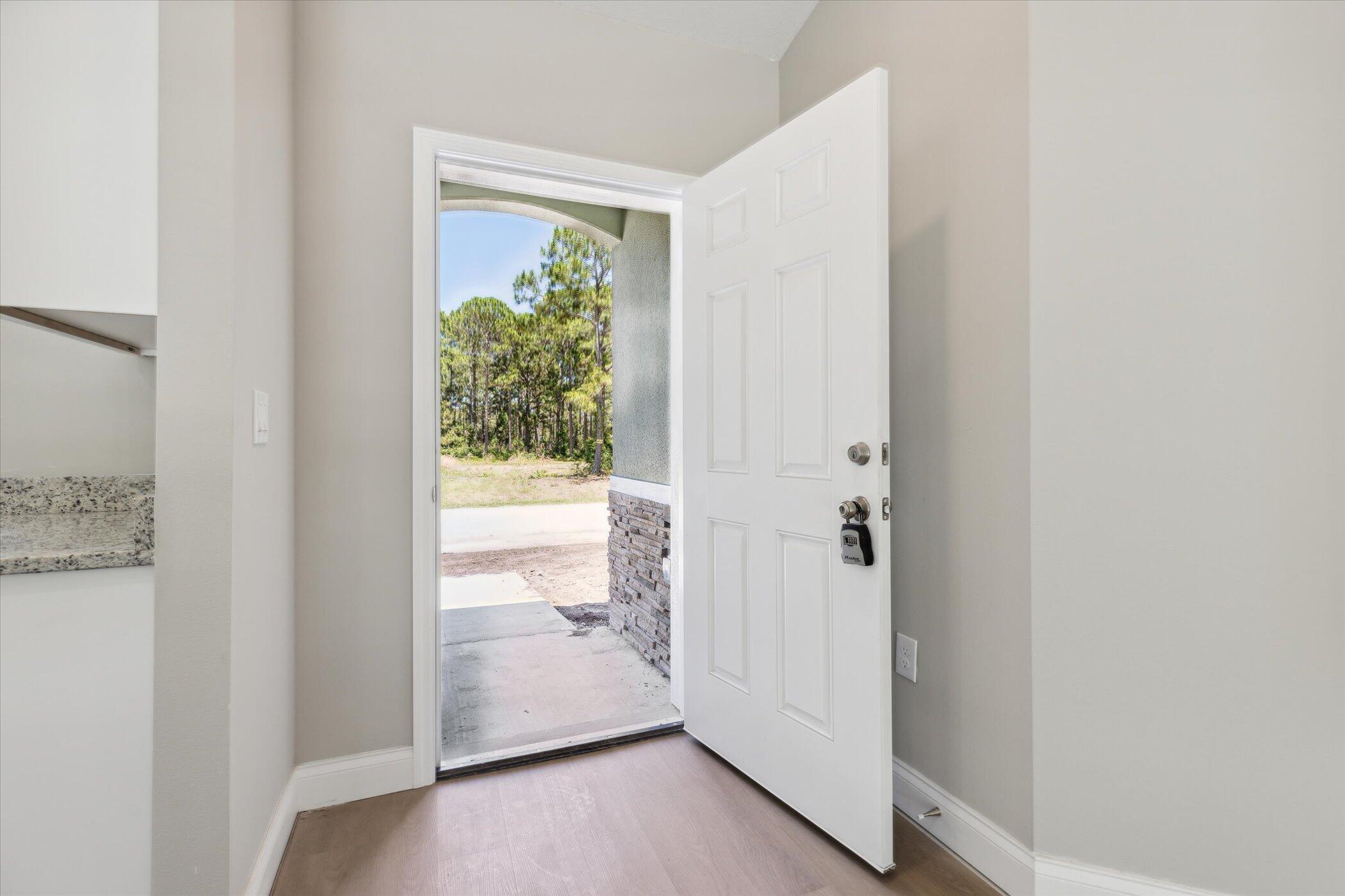 2414 Anchor Road Southeast Palm Bay, FL 32909 - Photo 2 of 25 06-2414-Anchor-Rd-SE-Palm-Bay-FL-32909-W