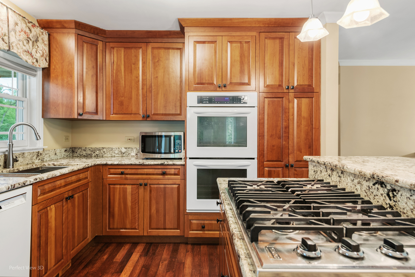 4s070 Rigi Road Naperville, IL 60563 - Photo 7 of 25 a kitchen with a stove a sink and wooden cabinets