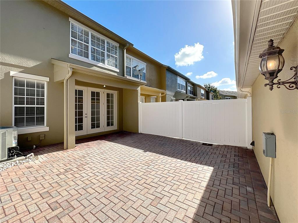12930 Vennetta Way Windermere, FL 34786 - Photo 31 of 38 a view of a house with a barbeque