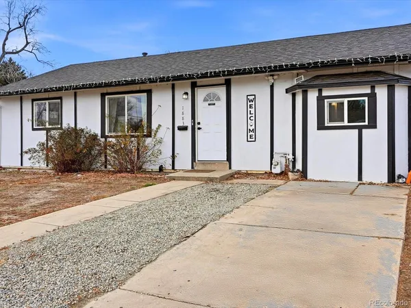 a front view of a house with a patio