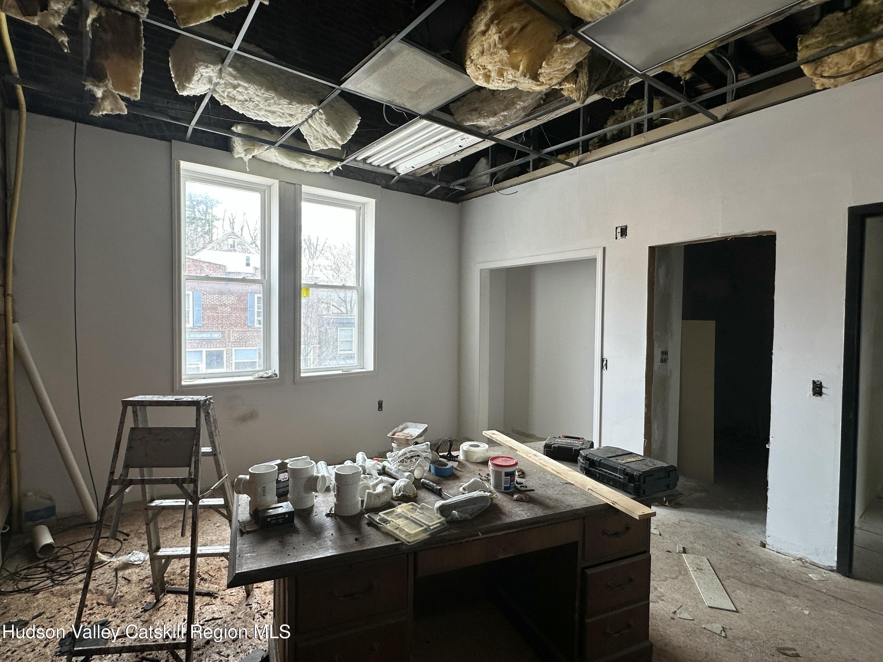 447 Main Street, Unit 477 Catskill, NY 12414 - Photo 16 of 34 a dining room with furniture
