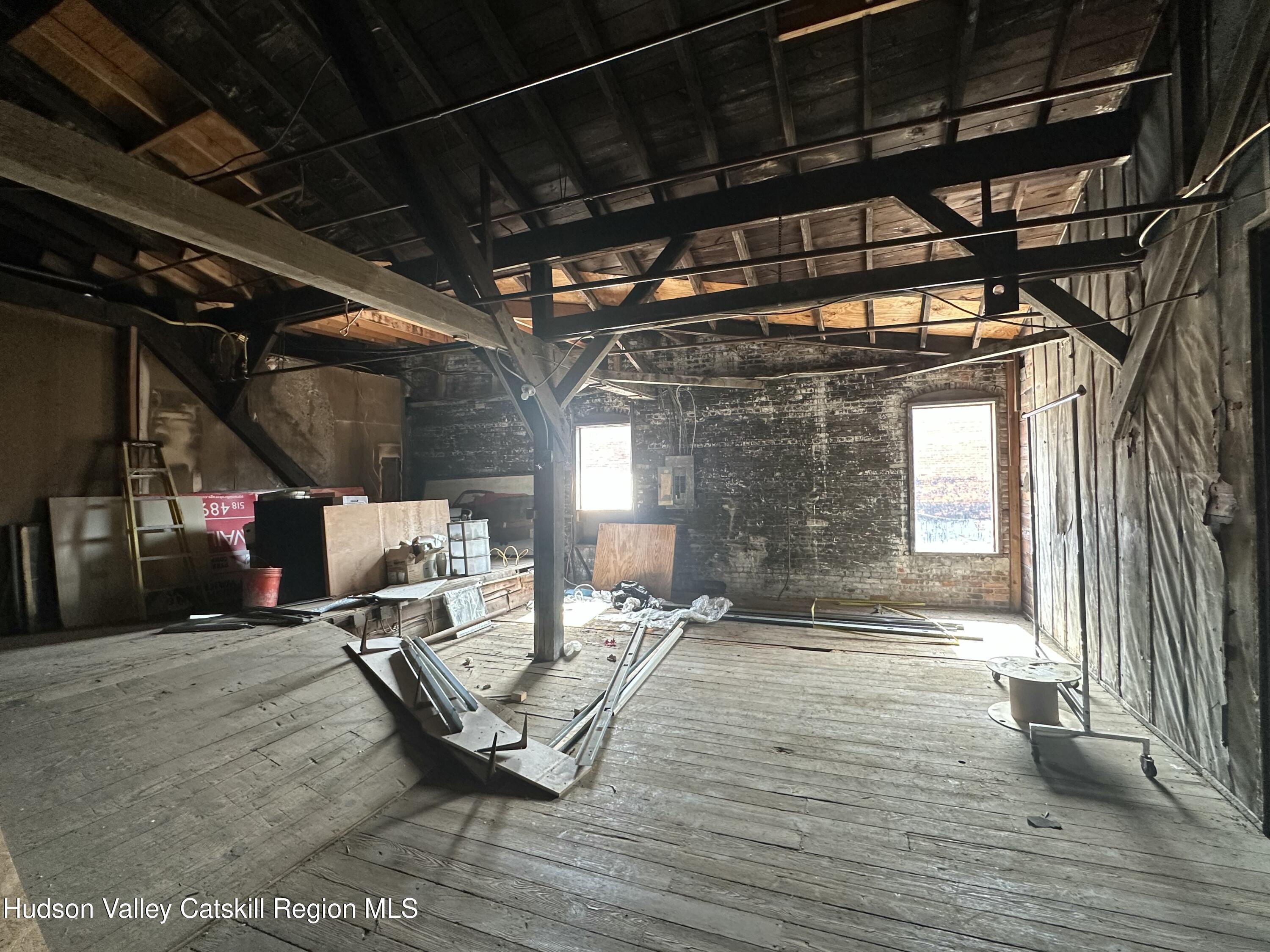 447 Main Street, Unit 477 Catskill, NY 12414 - Photo 24 of 34 a view of a room with wooden floor