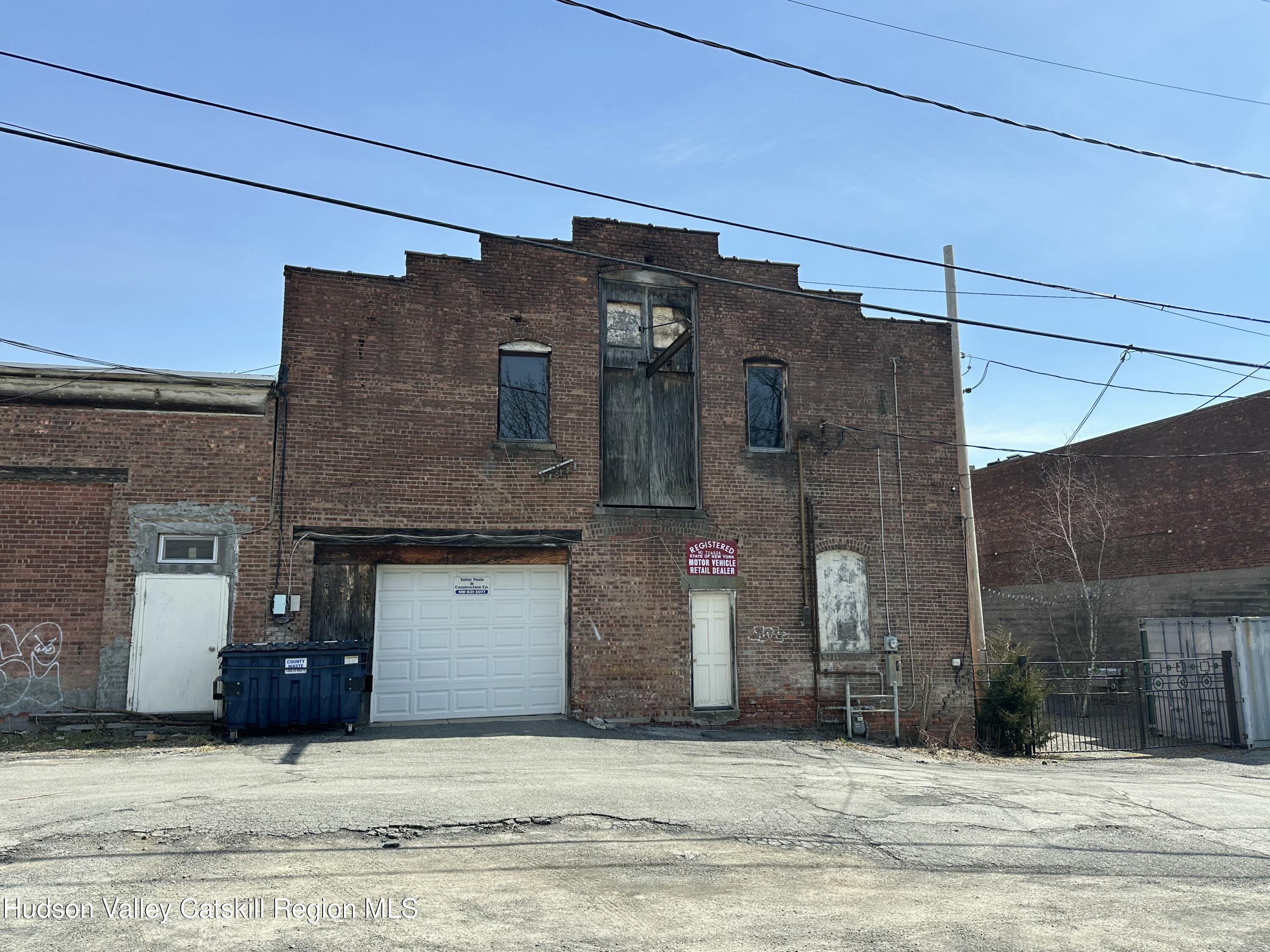 447 Main Street, Unit 477 Catskill, NY 12414 - Photo 31 of 34 a view of a house with a garage