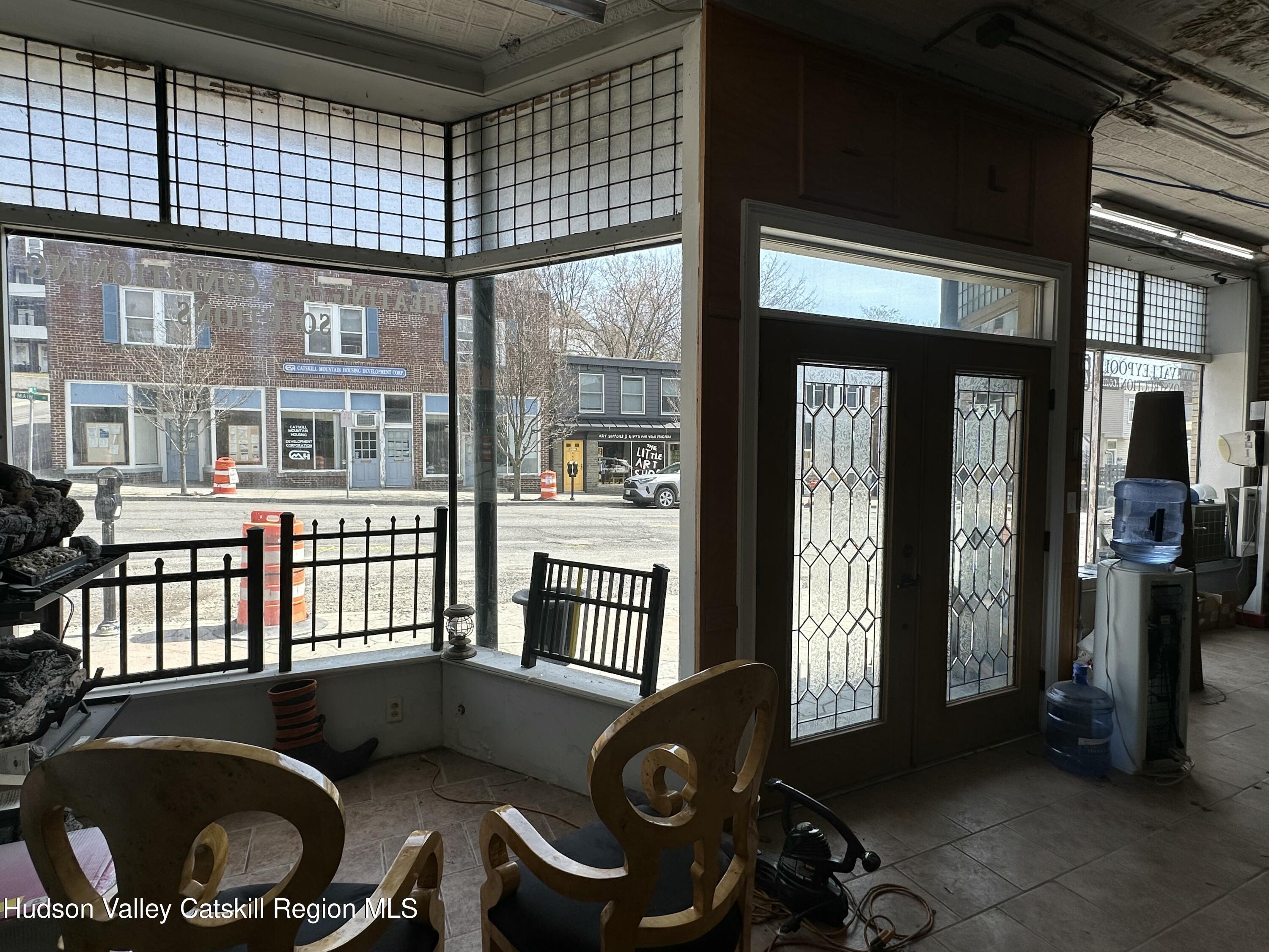 447 Main Street, Unit 477 Catskill, NY 12414 - Photo 8 of 34 a front view of a house with a large window