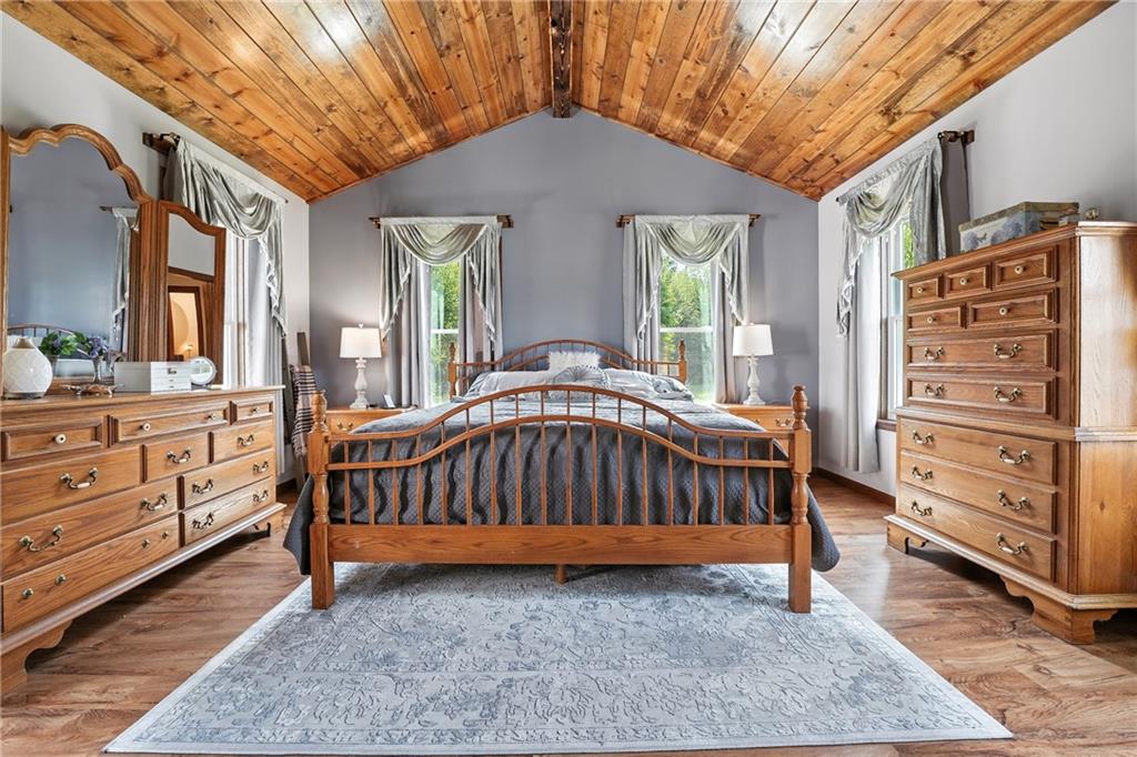246 Lyons Road Stoneboro, PA 16153 - Photo 14 of 40 a bedroom with a bed and a dresser