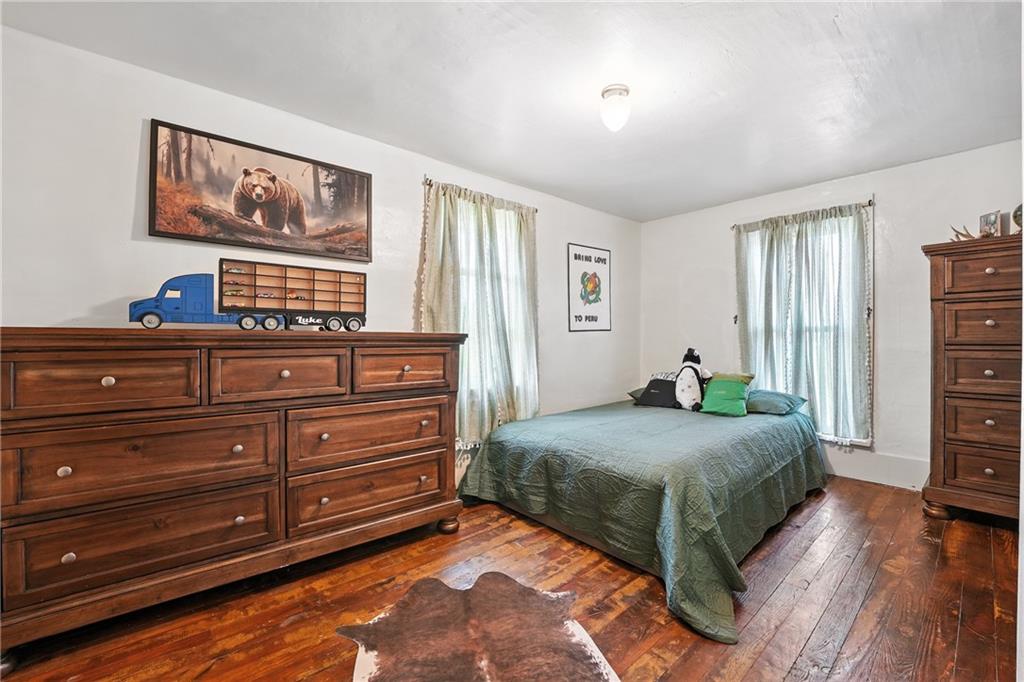 246 Lyons Road Stoneboro, PA 16153 - Photo 18 of 40 a bedroom with a bed and a dresser