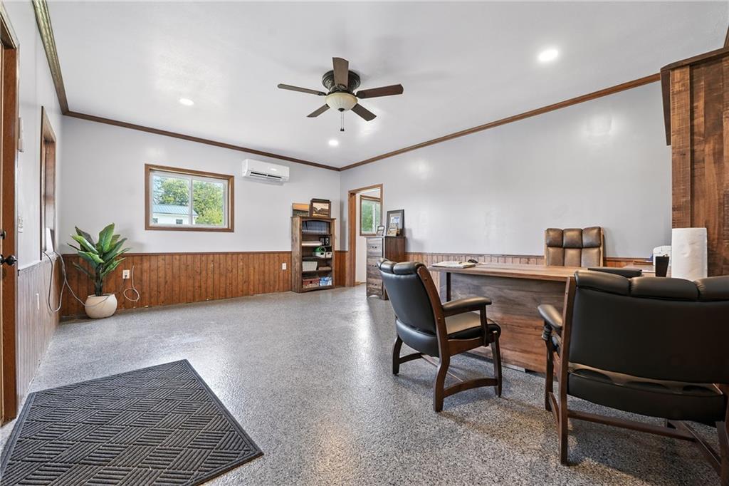 246 Lyons Road Stoneboro, PA 16153 - Photo 32 of 40 a living room with furniture and a potted plant