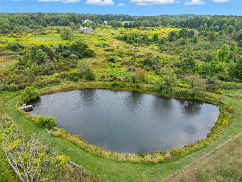246 Lyons Road Stoneboro, PA 16153 - Photo 36 of 40 a view of a lake with a yard