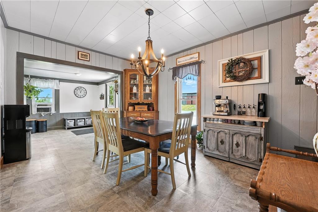 246 Lyons Road Stoneboro, PA 16153 - Photo 8 of 40 a view of a dining room with furniture window and wooden floor
