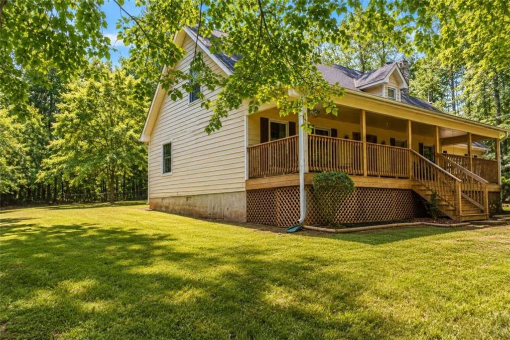 365 River Ridge Trail Oxford, GA 30054 - Photo 26 of 37 a view of a backyard of the house