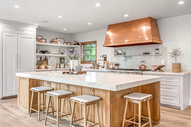 a room with round mirror and tiles