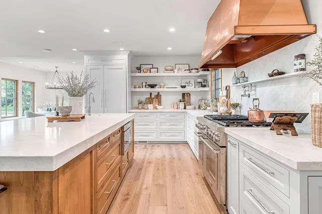 a bathroom with a sink a mirror and a shower