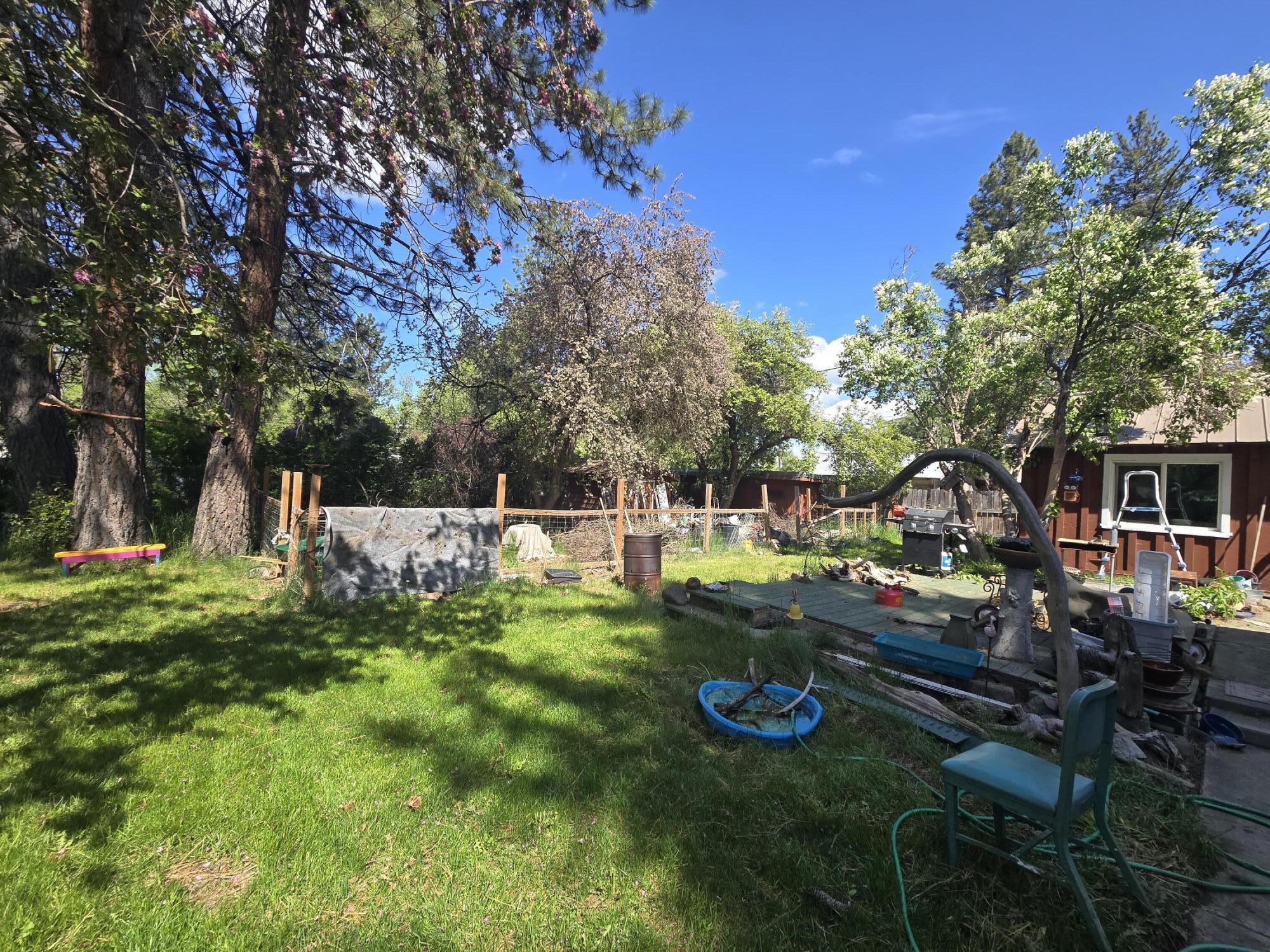 409 East Ash Street Chiloquin, OR 97624 - Photo 37 of 37 a view of backyard with swimming pool and seating space