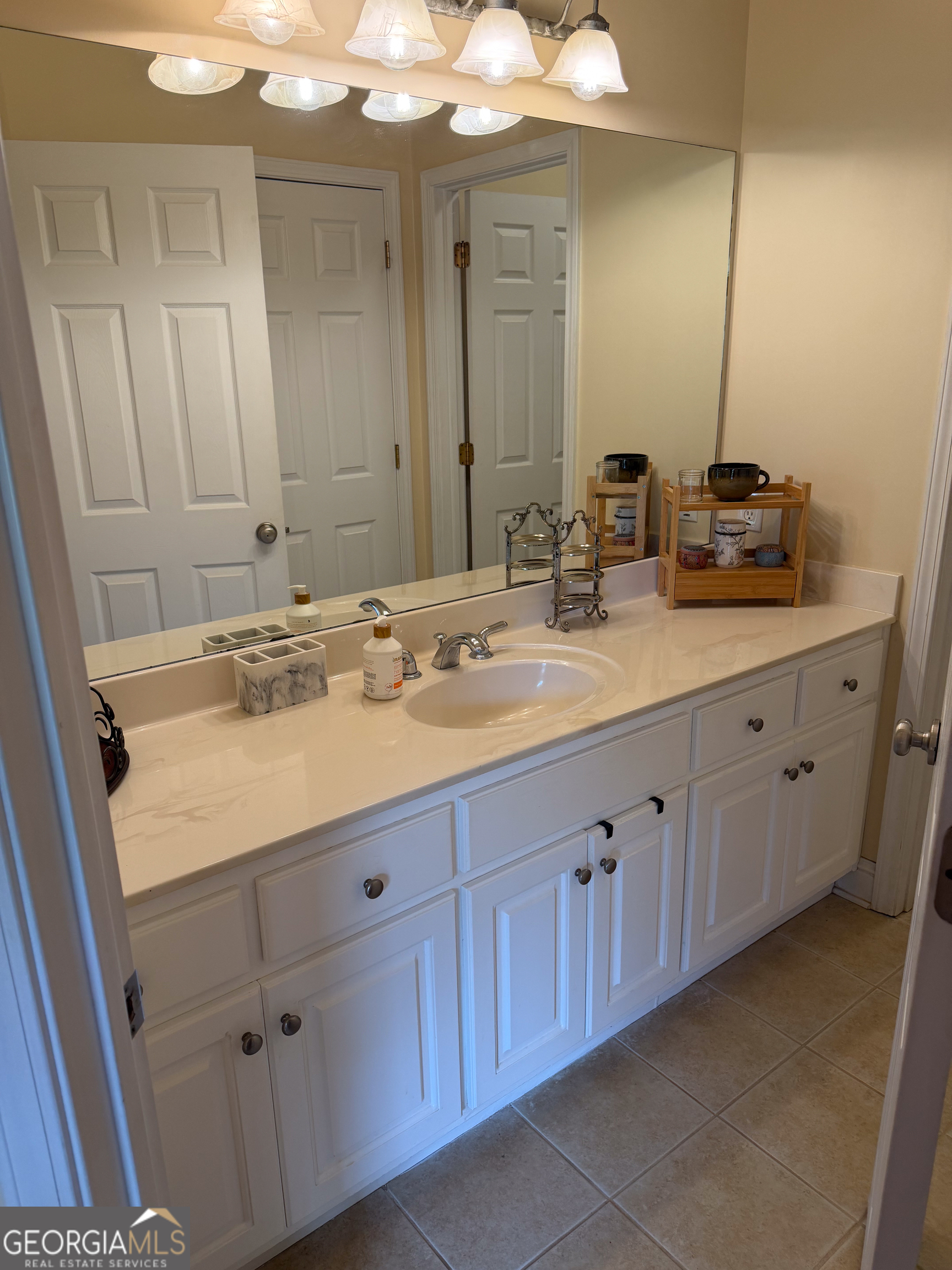 3385 Highway 83 Monticello, GA 31064 - Photo 32 of 47 a bathroom with a sink and a mirror