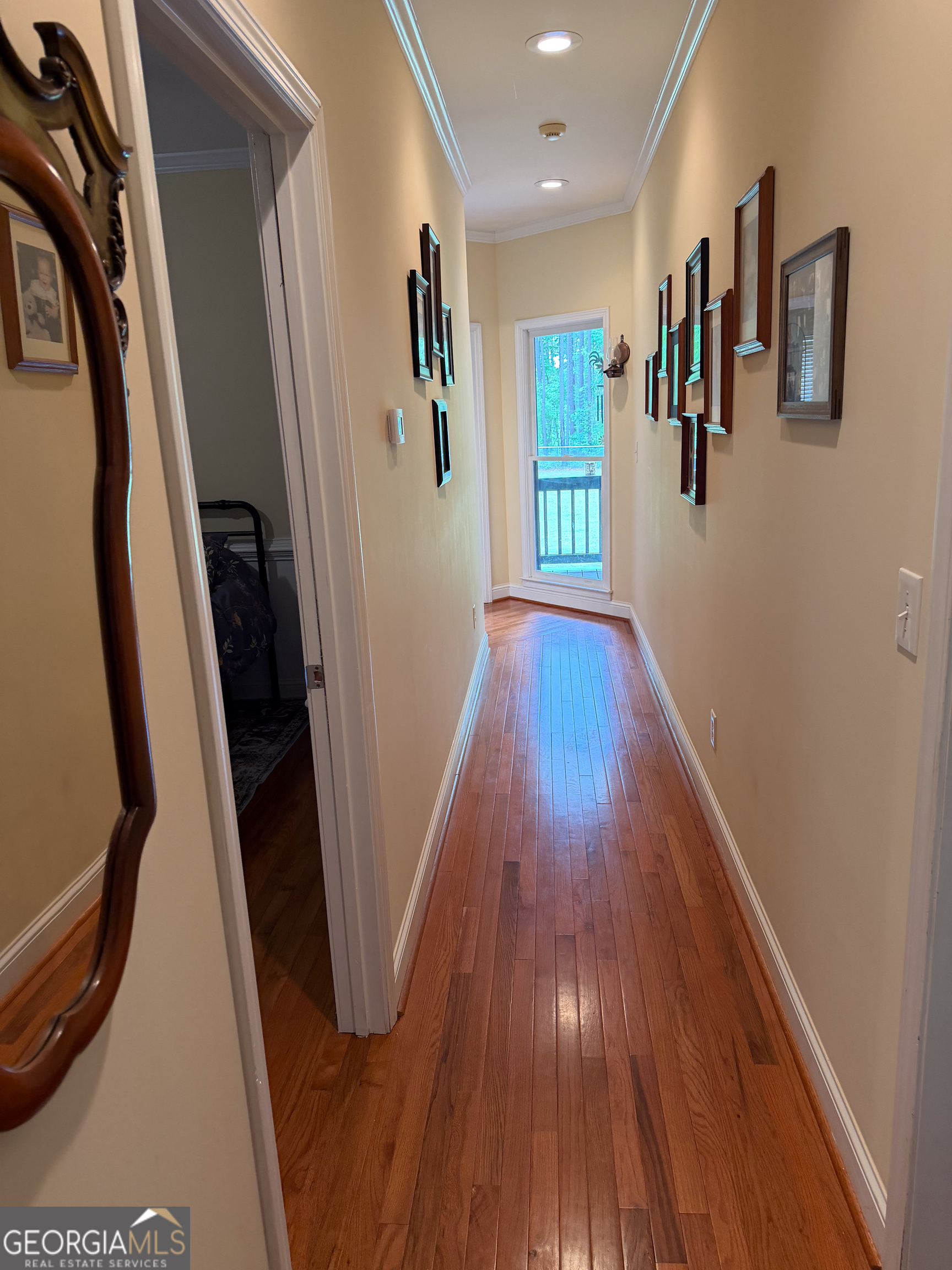 3385 Highway 83 Monticello, GA 31064 - Photo 33 of 47 a view of a hallway with wooden floor and stairs
