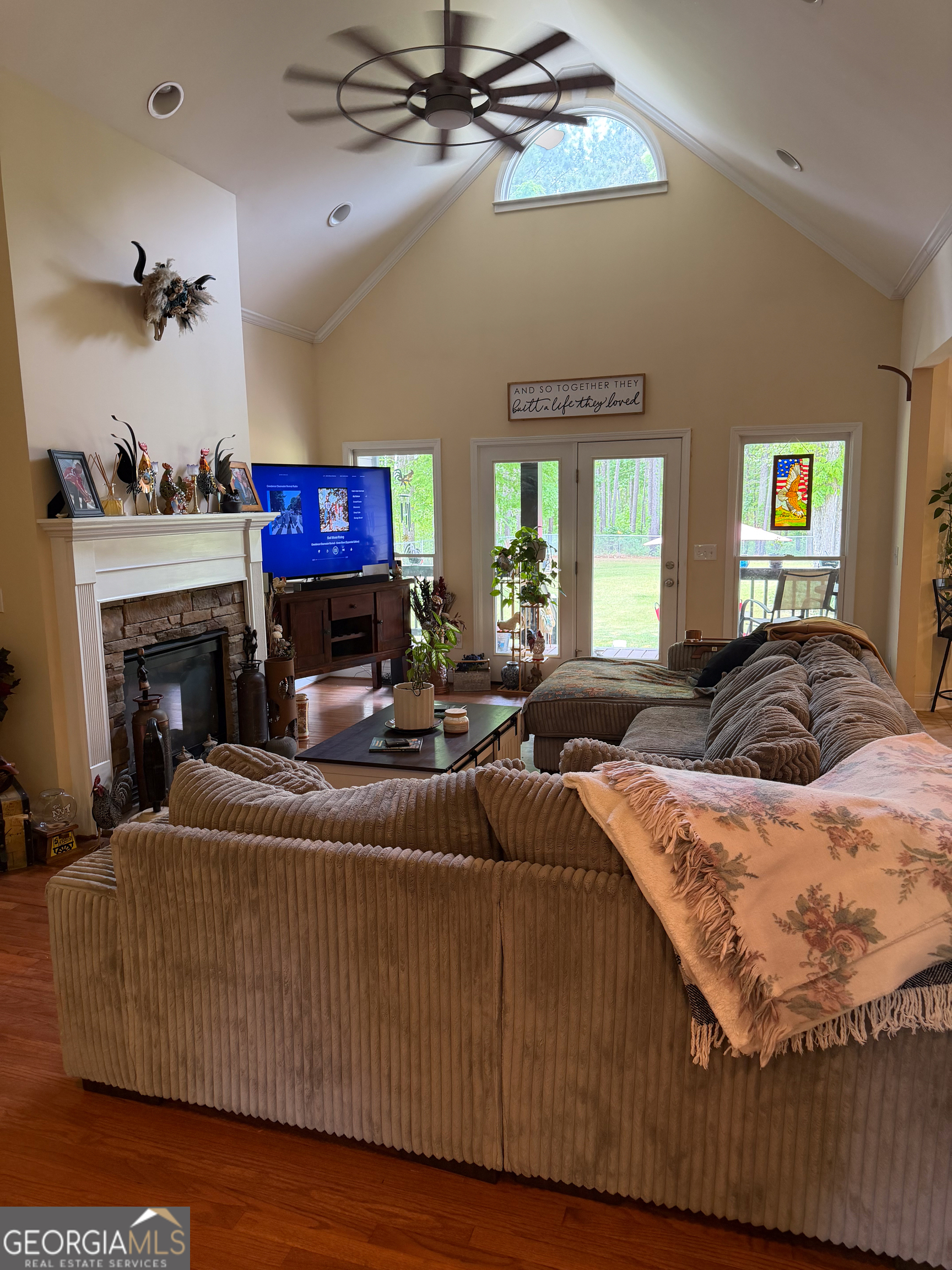 3385 Highway 83 Monticello, GA 31064 - Photo 38 of 47 a living room with furniture and a fireplace