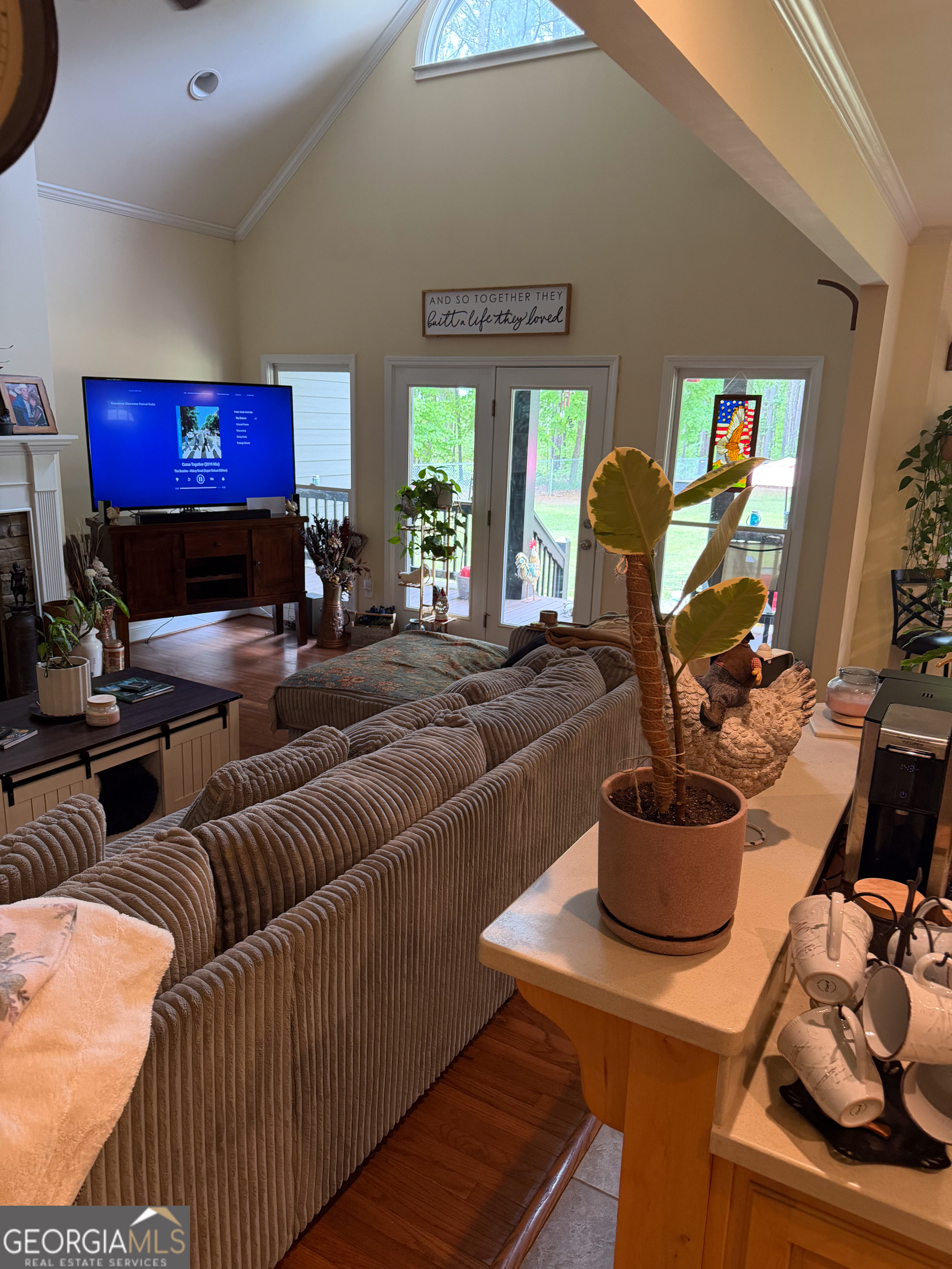 3385 Highway 83 Monticello, GA 31064 - Photo 39 of 47 a living room with furniture a large window and a flat screen tv